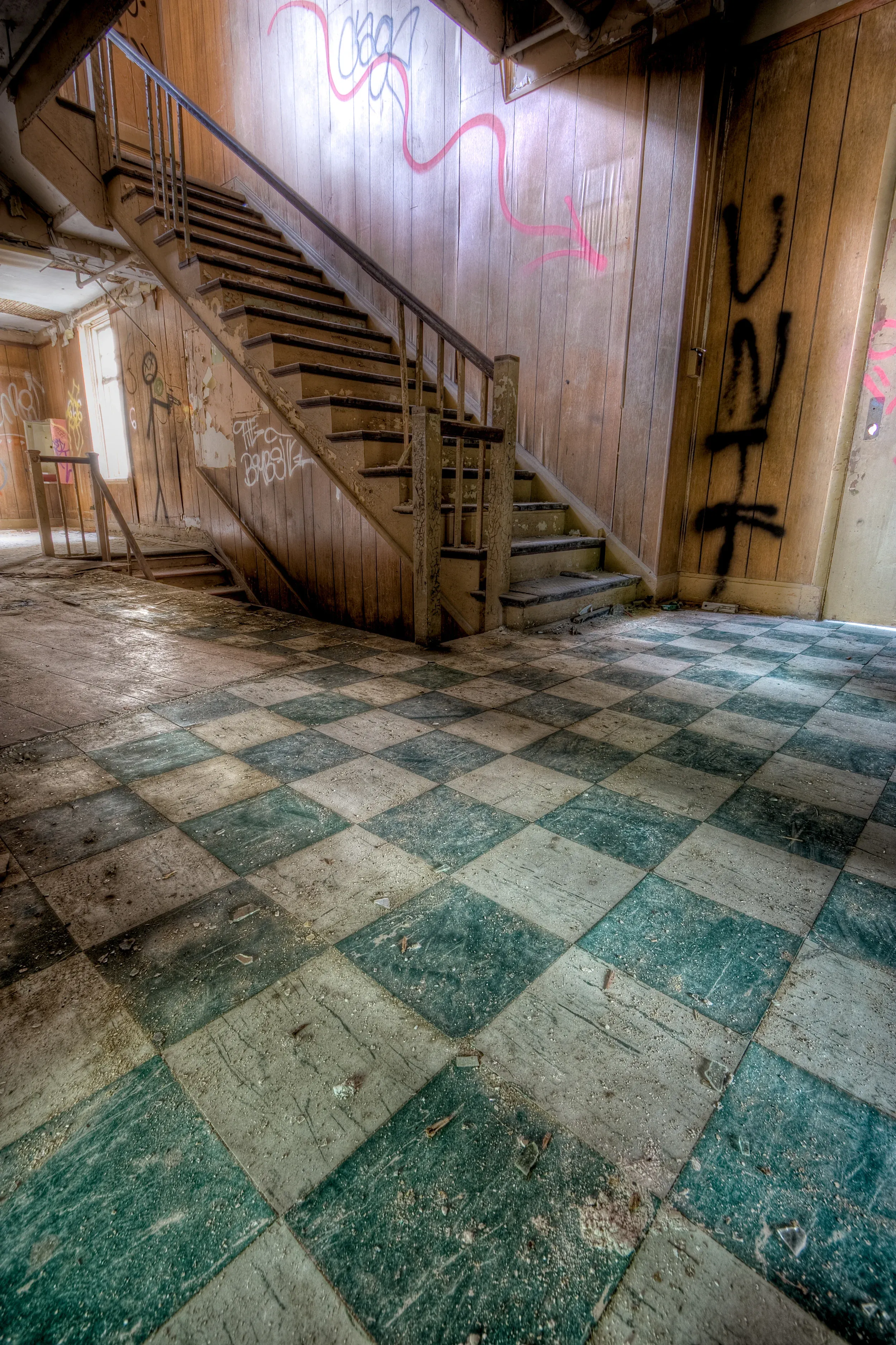 Checkerboard floor in abandoned room
